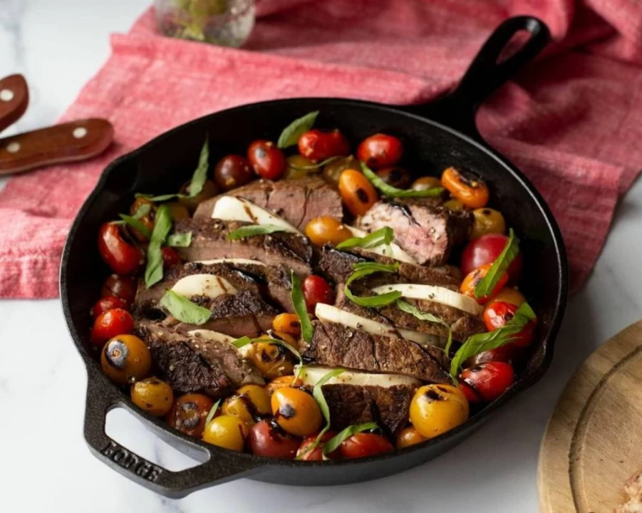 Lodge 10.25-Inch Cast Iron Skillet with Heat-Resistant Red Silicone Handle Cover, Pre-Seasoned, Oven Safe