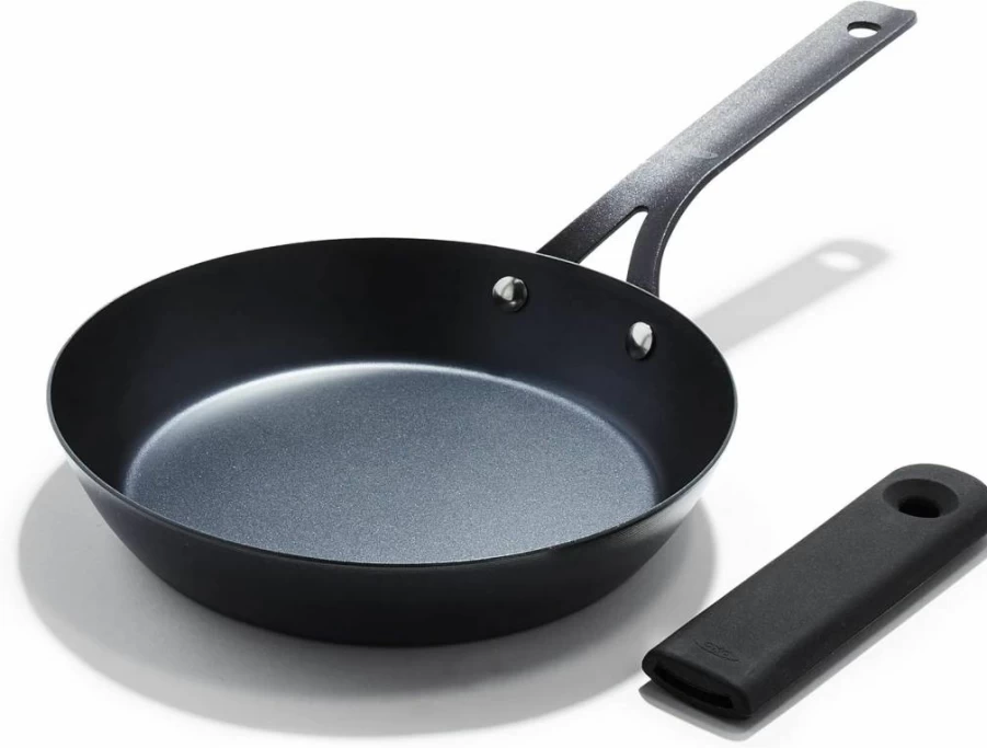 OXO 10-Inch Pre-Seasoned Carbon Steel Skillet - Induction & Oven Safe Frying Pan with Removable Silicone Handle Holder, Black