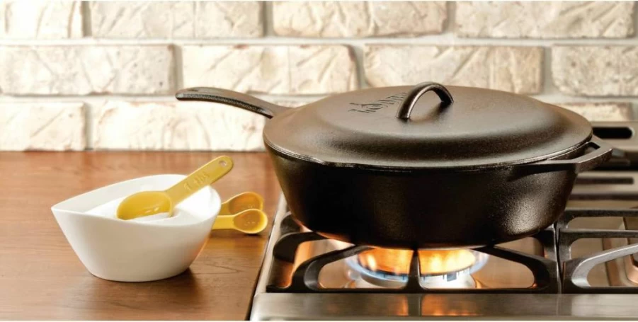 Lodge 5 Quart Cast Iron Skillet with Lid - Pre-Seasoned Deep Pan for Oven, Stove, Grill, Campfire - Teardrop & Assist Handles - Sear, Sauté, Bake, Broil, Braise, Fry, Grill - Black